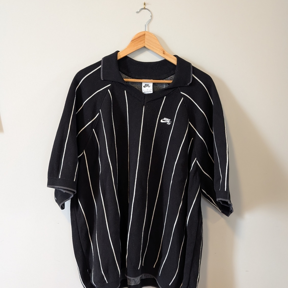 Nike Men's Black Polo with White Stripes